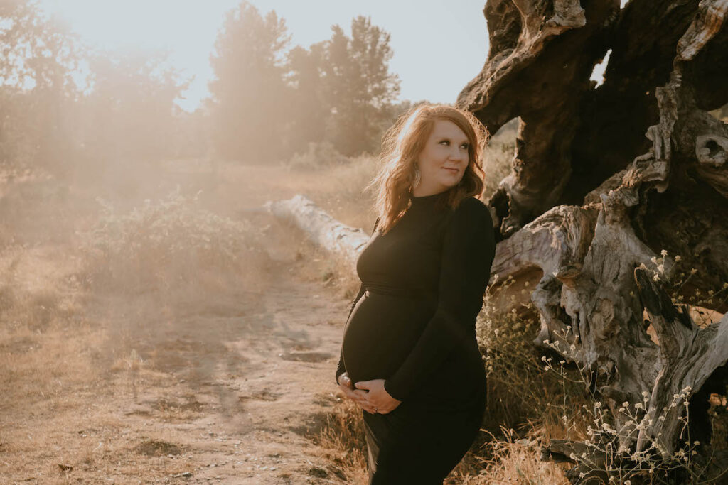 Pregnant woman during sunset maternity session in Salem, Oregon