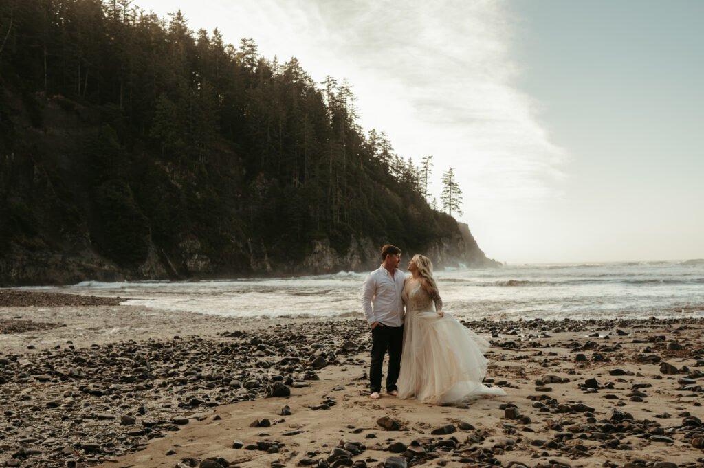 bride and groom looking at each other during their oregon coast elopement