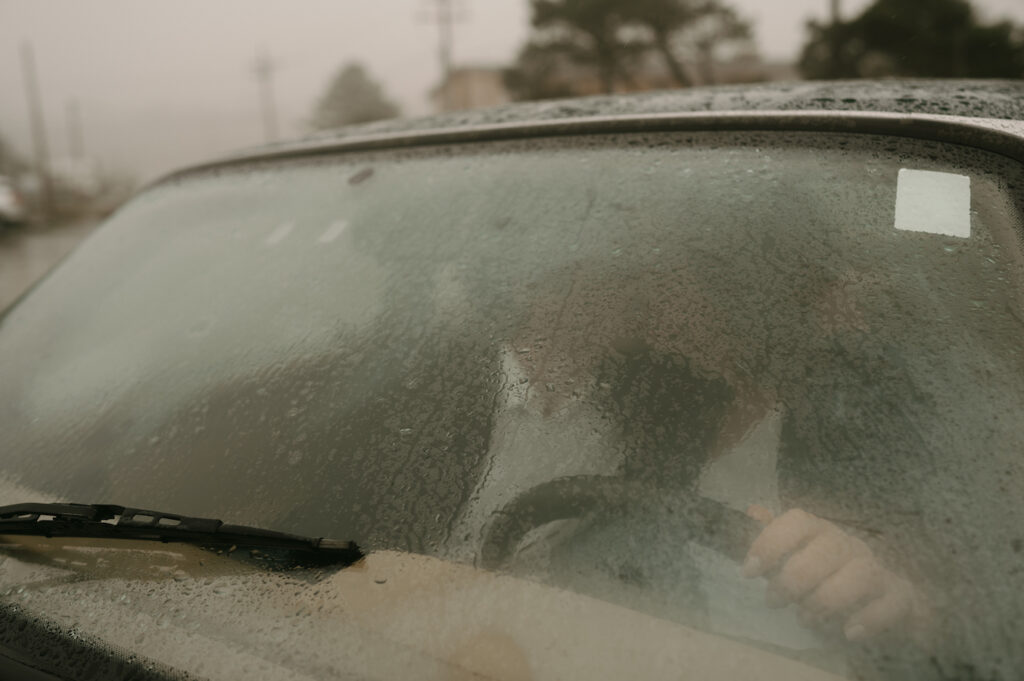 rain on windshield during oregon coast couples session