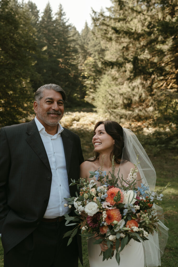 father and daughter during first look 